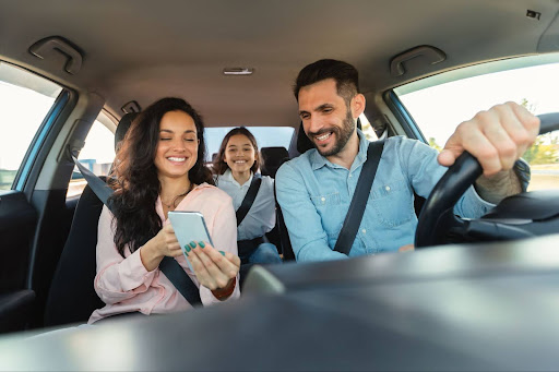 Family in a car.