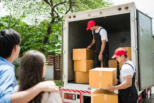 Moving boxes in a moving truck.